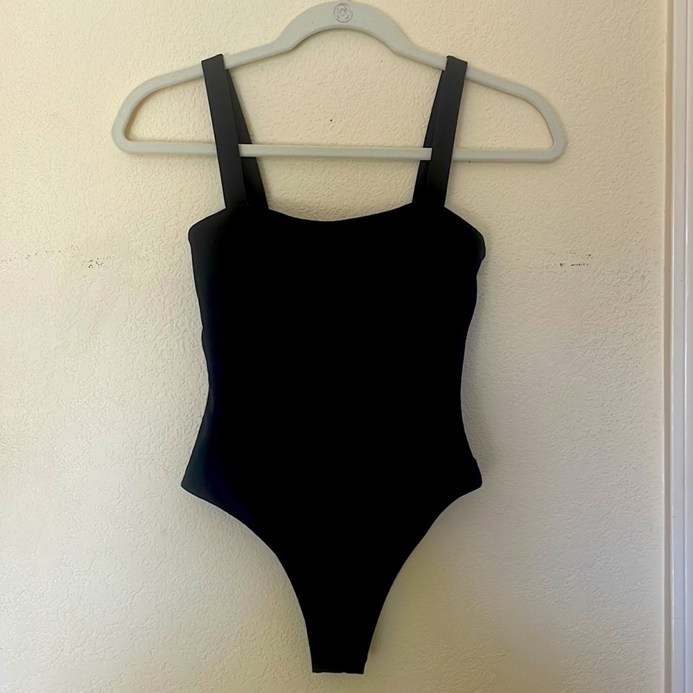 Wanderlust cheeky black one peice